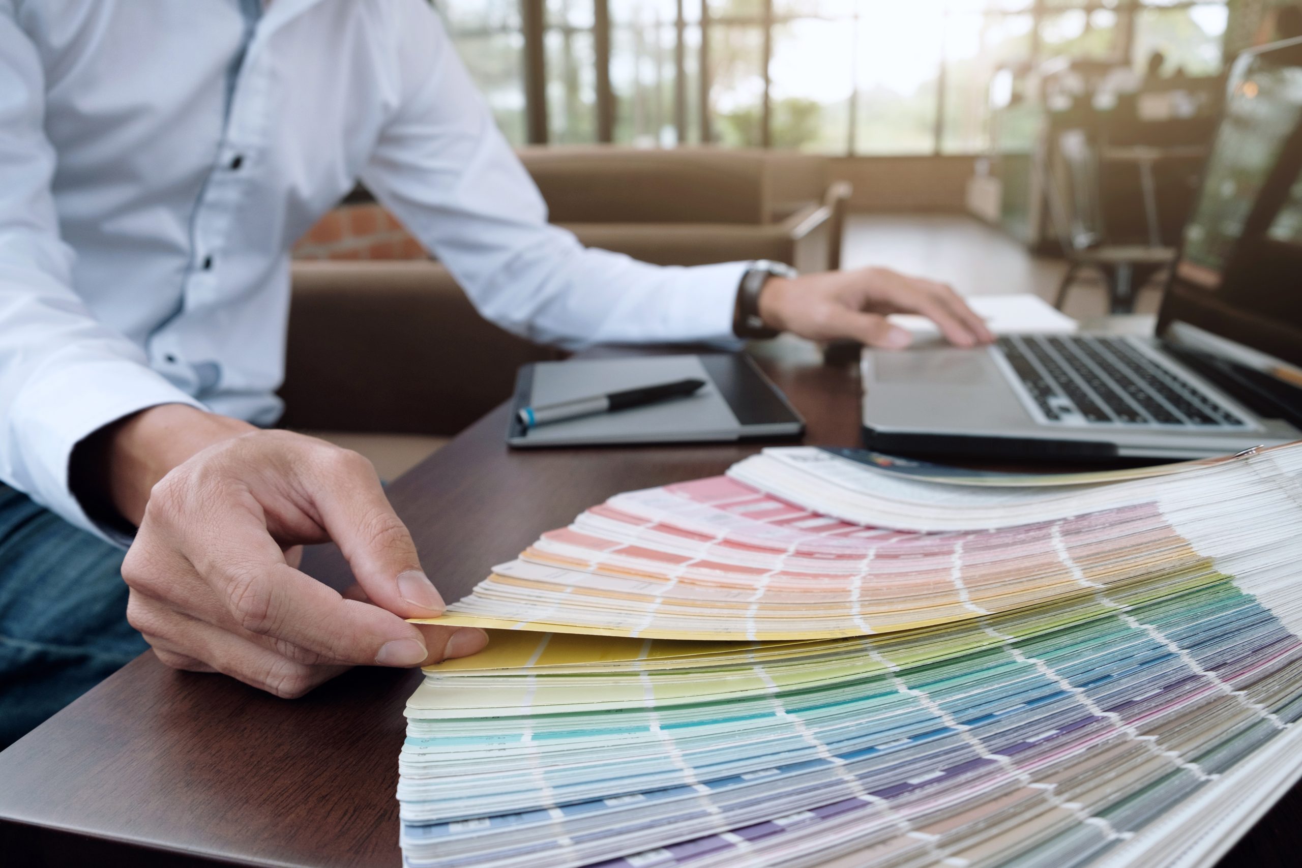 graphic design and color swatches and pens on a desk. architectu